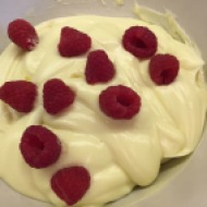 Adding raspberries to white chocolate cheesecake